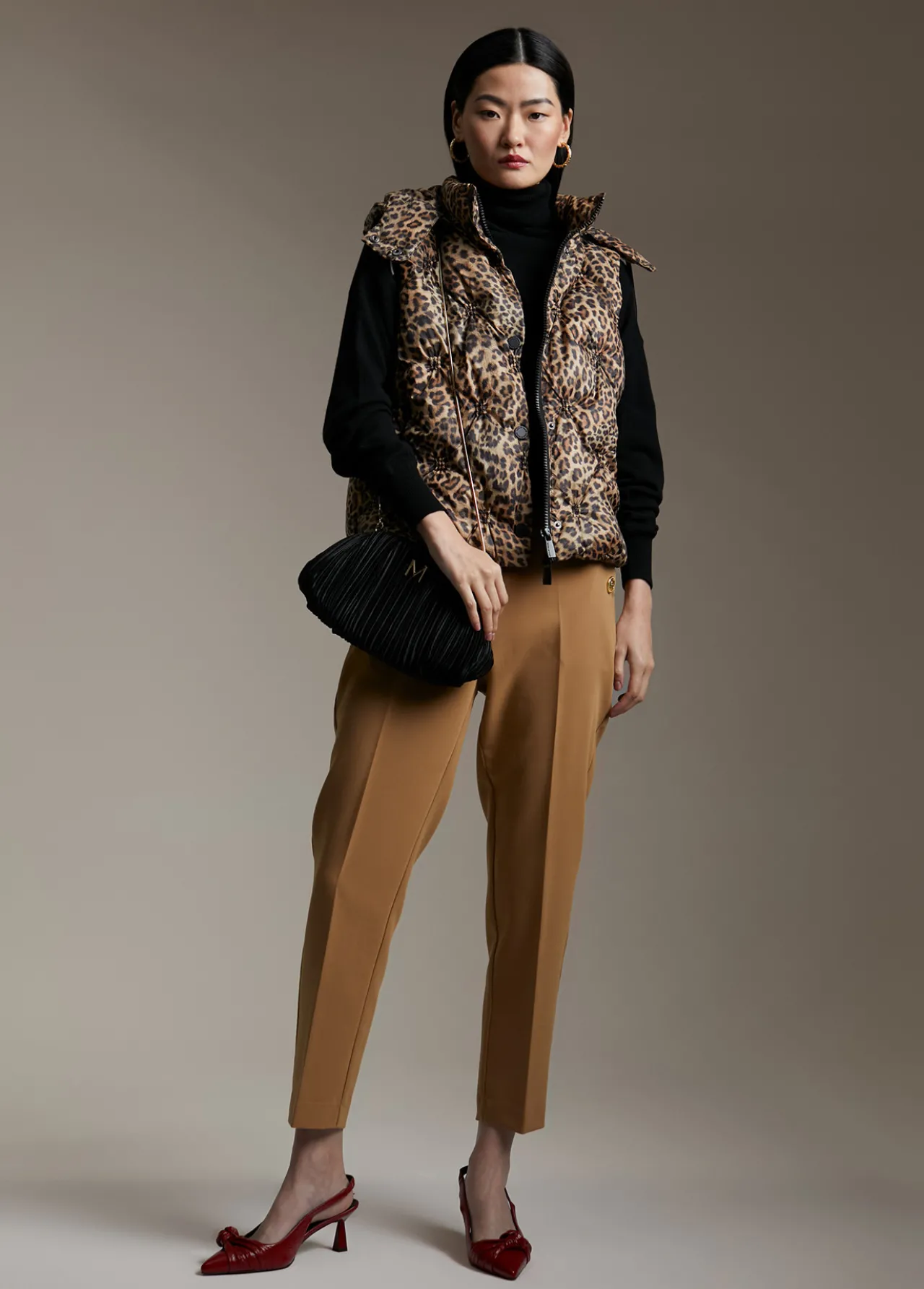 chaleco_acolchado_animal_print_2-1.webp Lola Casademunt Animal Print | Chalecos<Chaleco acolchado animal print FUCSIA