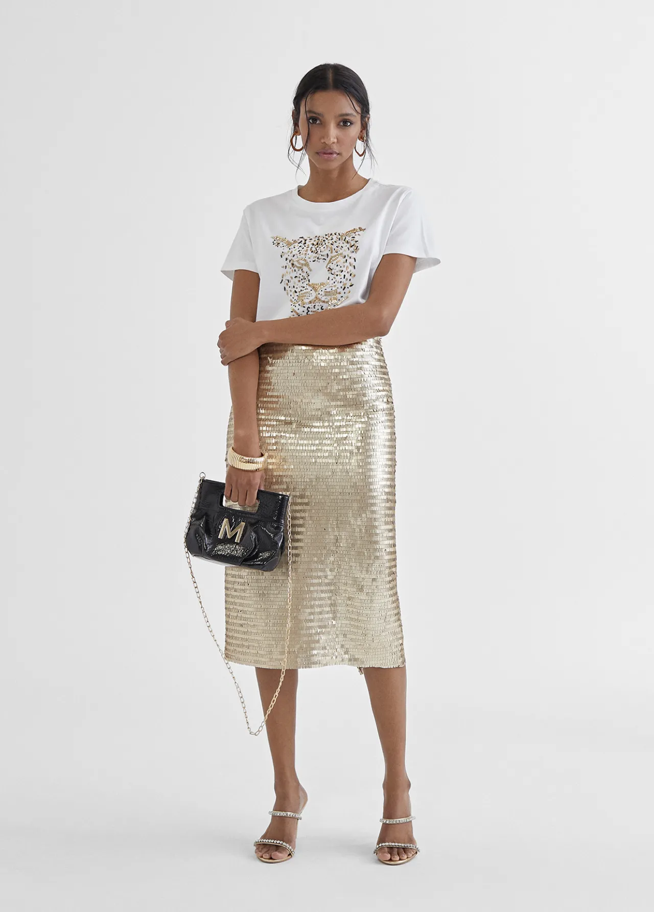 falda_lpiz_metalizada_1.webp Lola Casademunt Vestidos Y Faldas<Falda lápiz metalizada DORADO
