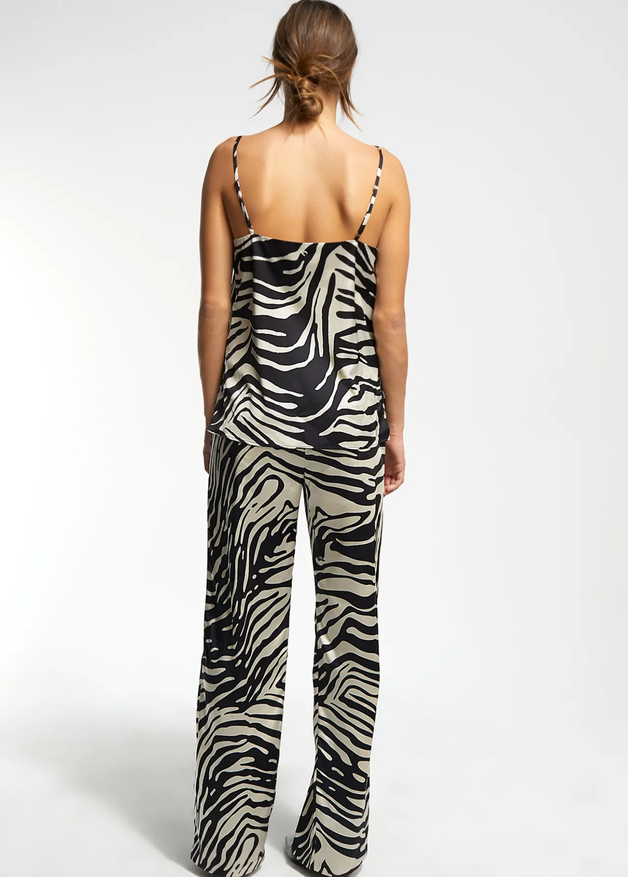 pantaln_palazzo_cebra_1.webp Lola Casademunt Animal Print | Pantalones<Pantalón palazzo cebra NEGRO-CRUDO