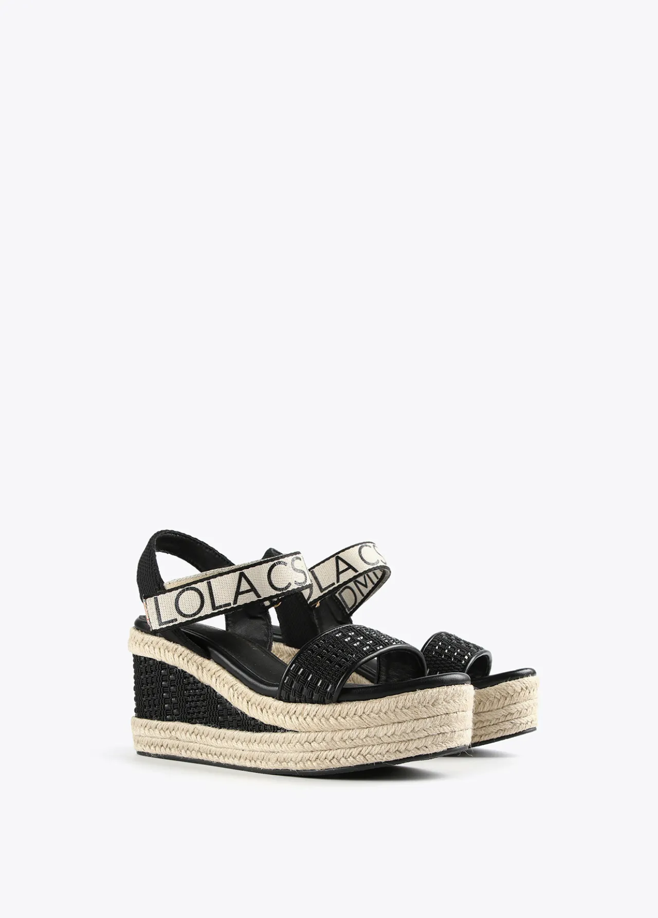 sandalia_negra_tipo_cua_1.webp Lola Casademunt Calzado<Sandalia negra tipo cuña NEGRO-CRUDO