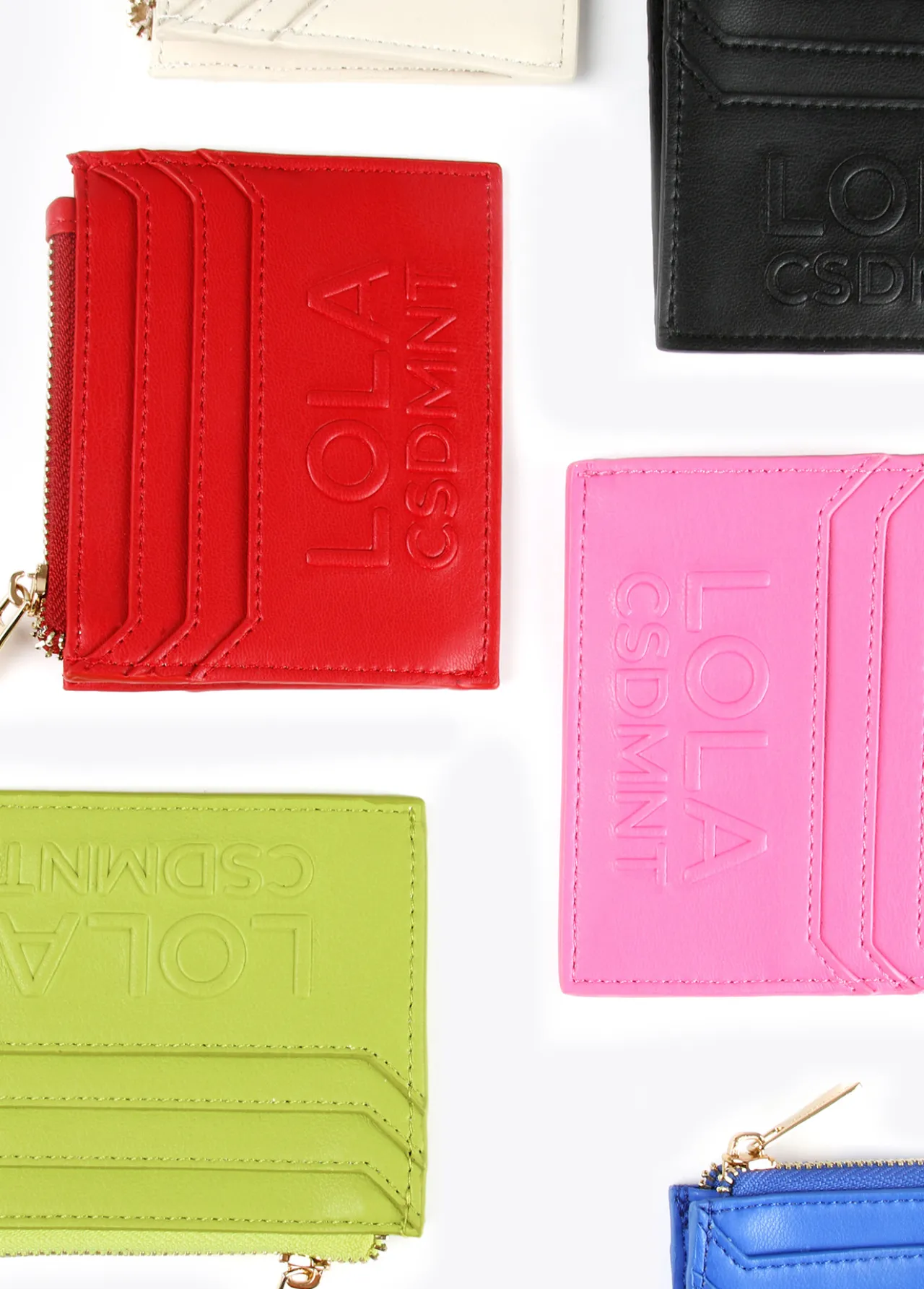 tarjetero_logo_con_relieve_5-1.webp Lola Casademunt Accesorios | Bolsos<Tarjetero logo con relieve FUCSIA